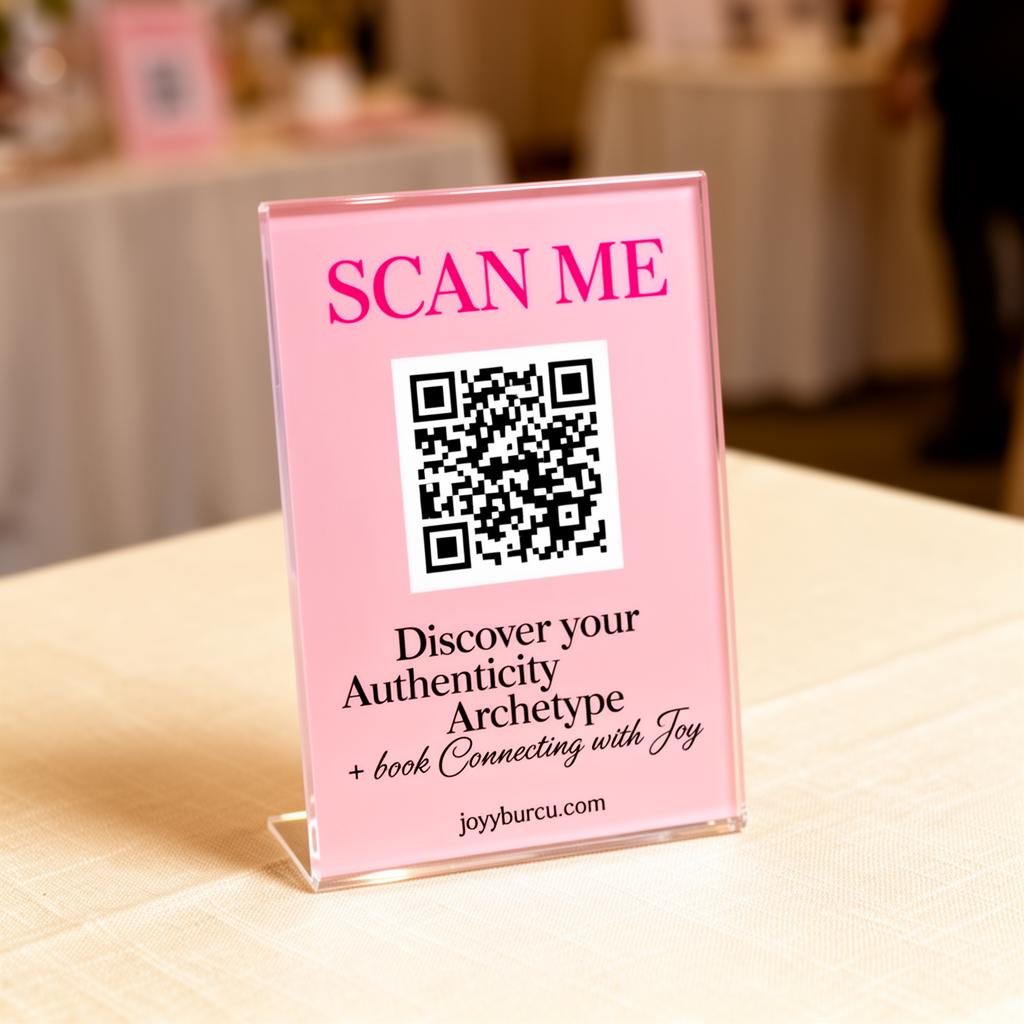 Pink acrylic QR code stand reading Scan Me